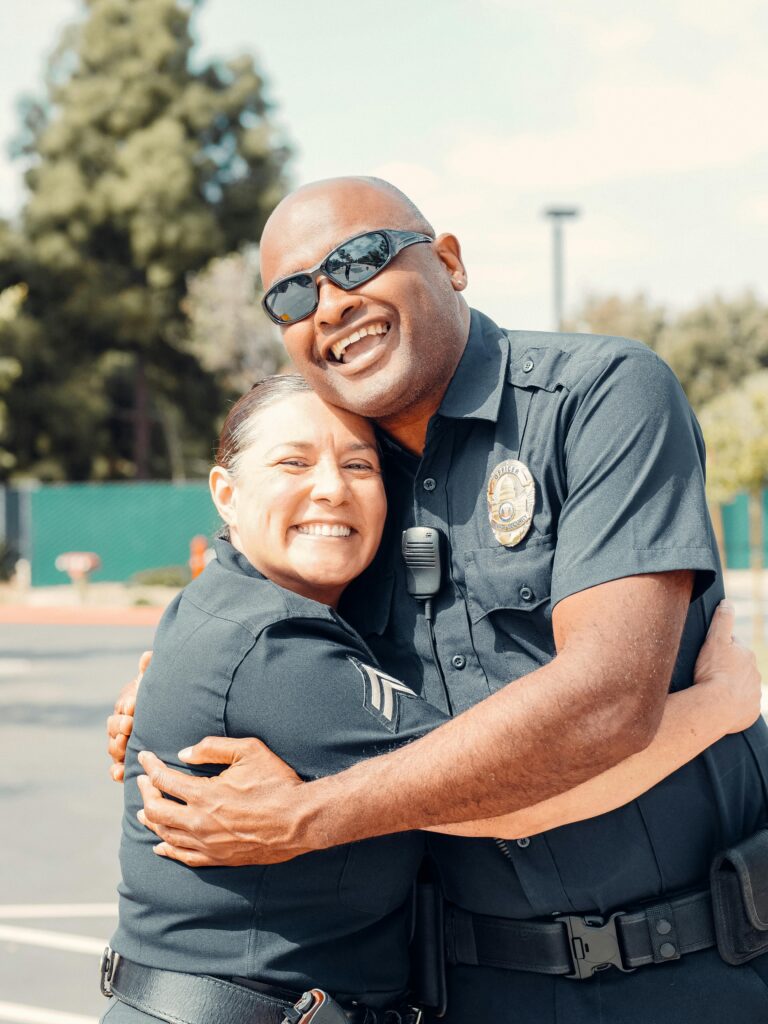 police officers hugging